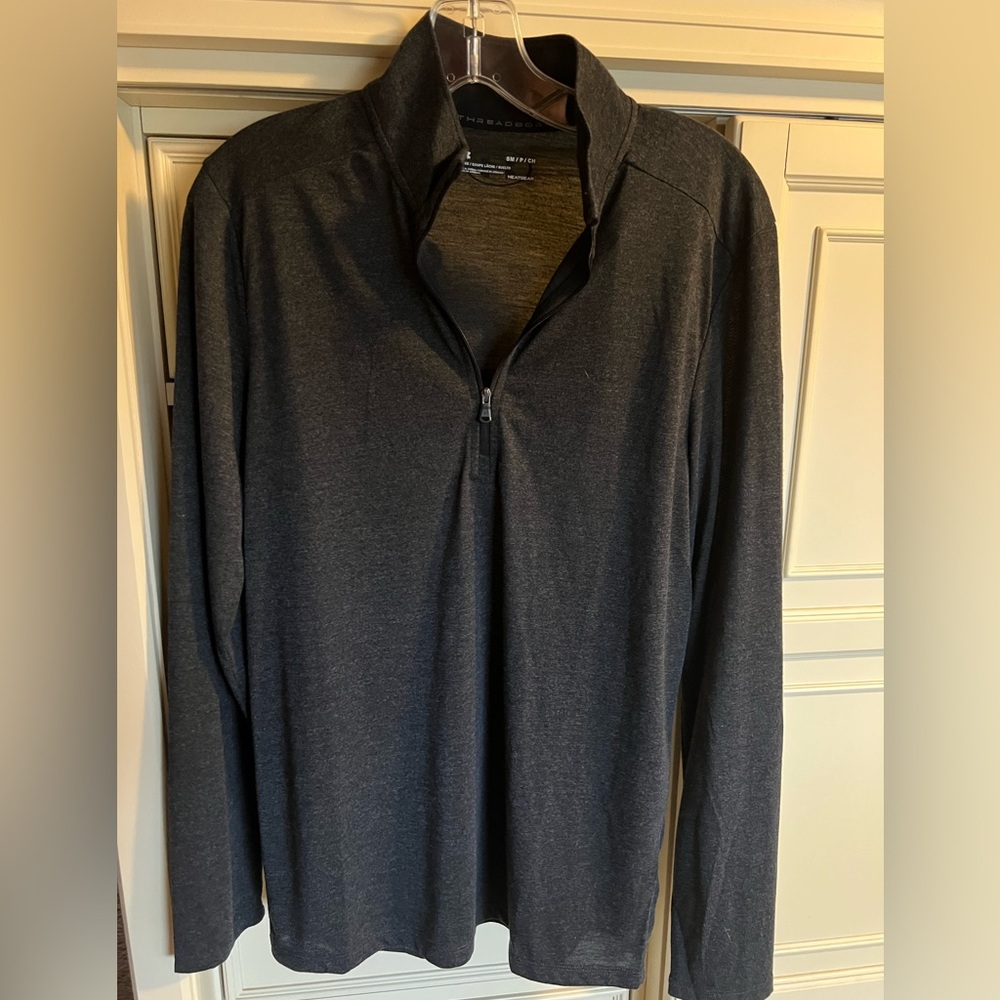 Men’s 1/4 zip Under Armour shirt